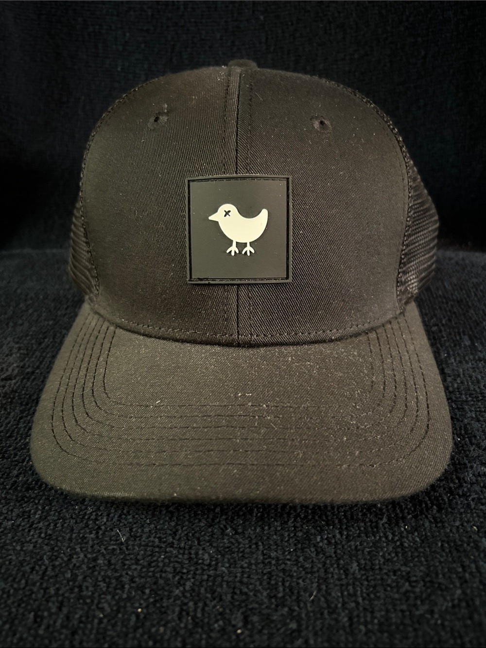 Bad Birdie Logo Black Mesh Trucker Hat and White Bird Logo with Snap Back
